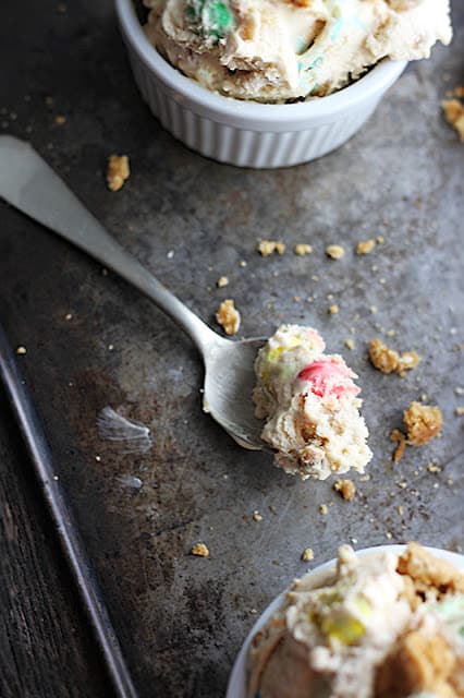 spoon with a scoop of ice cream on a baking sheet. 