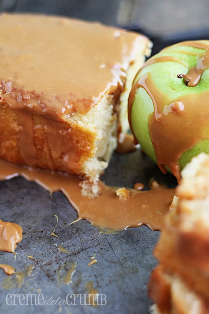 pound cake and green apple drizzled with caramel on a baking sheet.