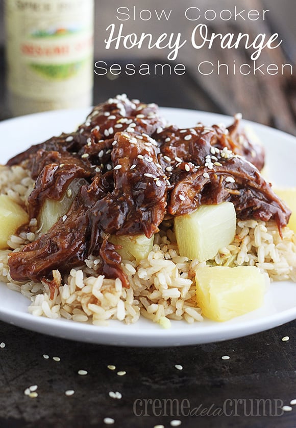 honey orange sesame chicken on rice with pineapple pieces and the title written on the top right corner of the image.