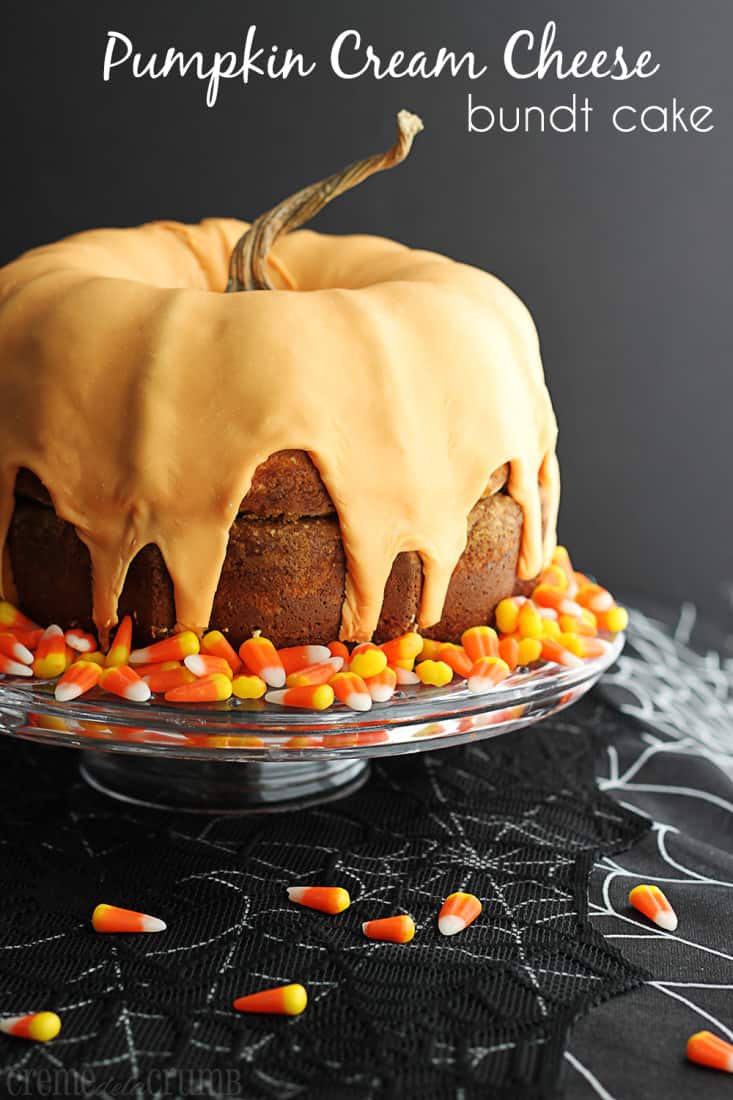 bundt cake on a cake platter with a stem of a pumpkin on the top and candy corn with the title written on the top of the image.