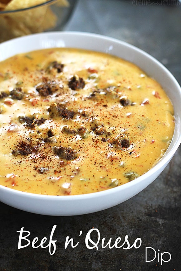 beef n' queso dip in a bowl with the title written on the bottom of the image.