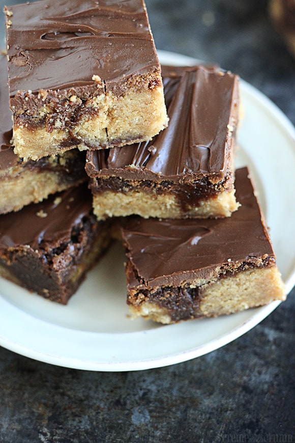 chocolate peanut butter brownie bites on a plate.