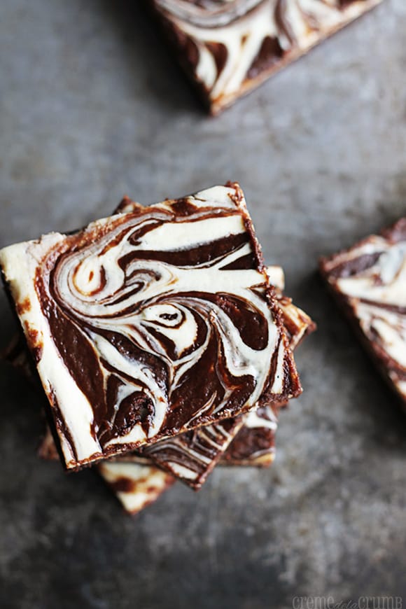 top view of stacked peppermint cheesecake swirl brownies.