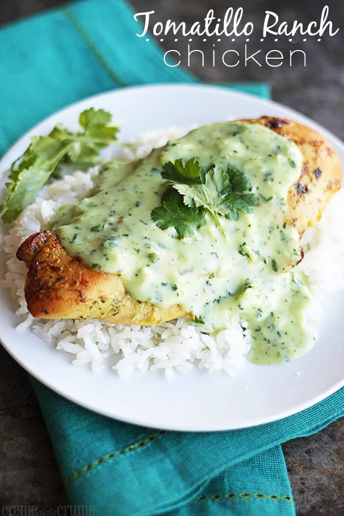tomatillo ranch chicken on rice on a plate on top of a blue cloth napkin with the title of the recipe written on the top right corner of the image.