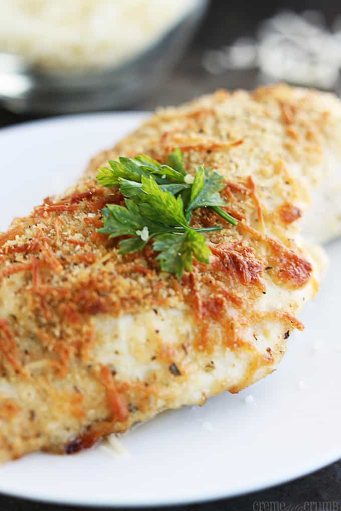 up close view of garlic parmesan chicken on a plate.