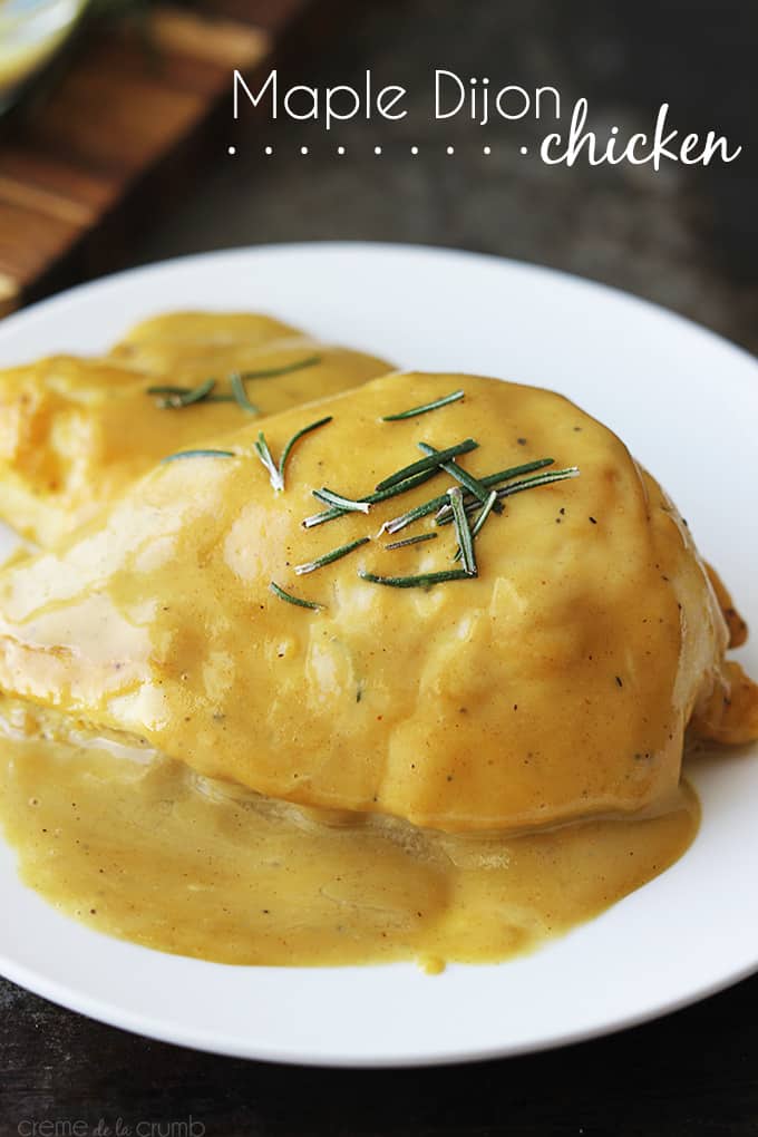 maple dijon chicken on a white plate with the title of the recipe written on the top right corner of the image.