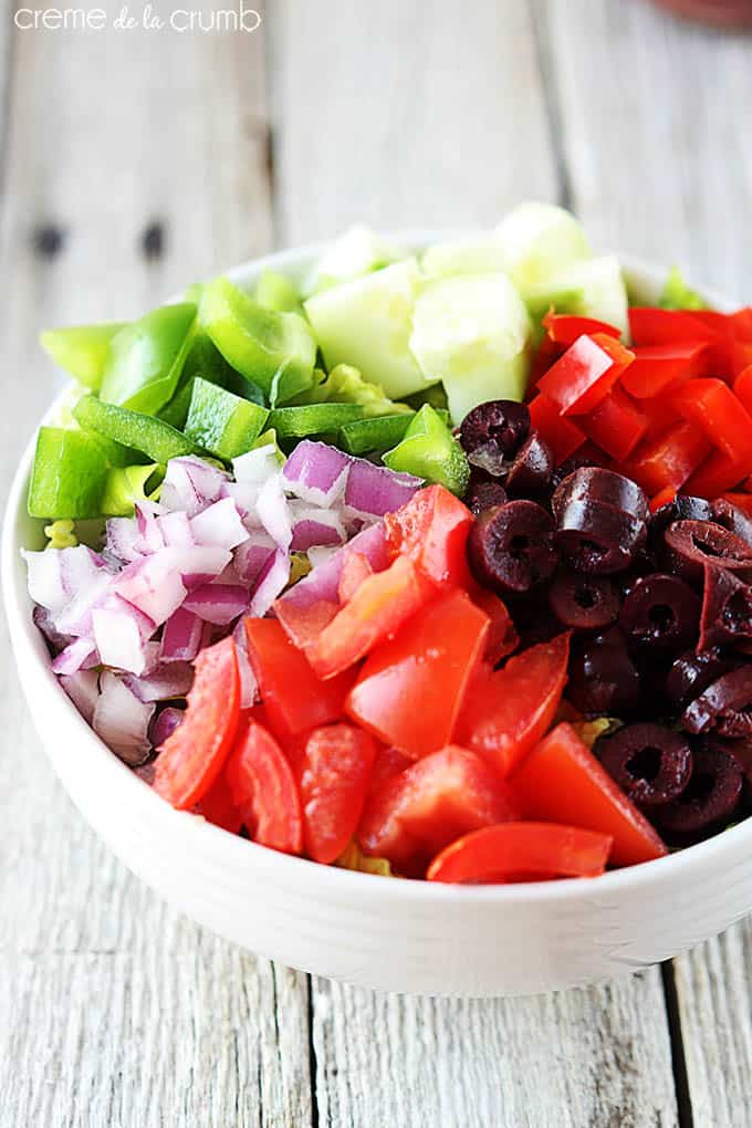 top view of Greek chopped salad in a bowl.