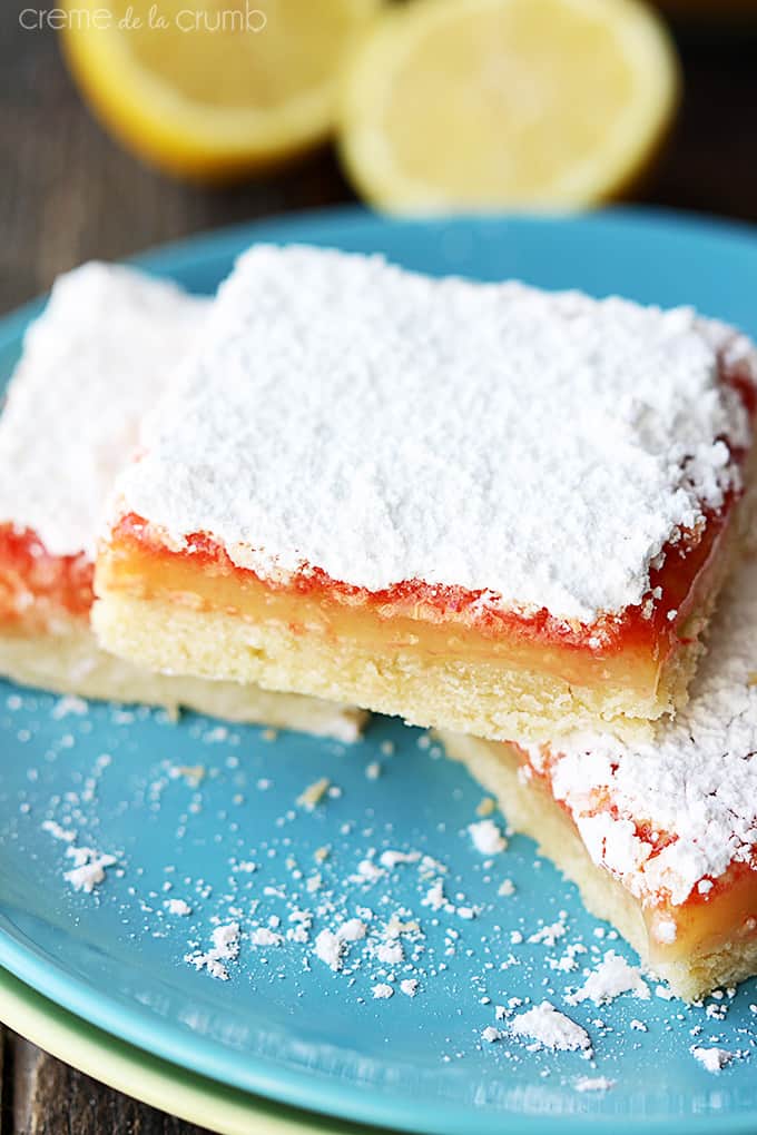 close up of raspberry lemon bars on a plate.