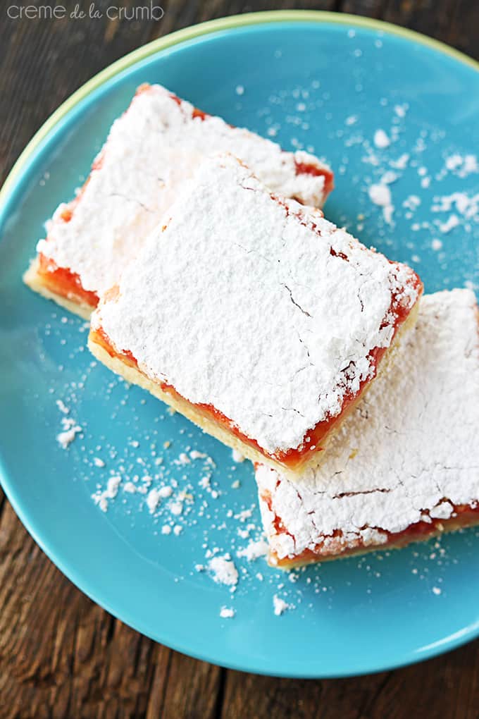 top view of raspberry lemon bars on a plate.