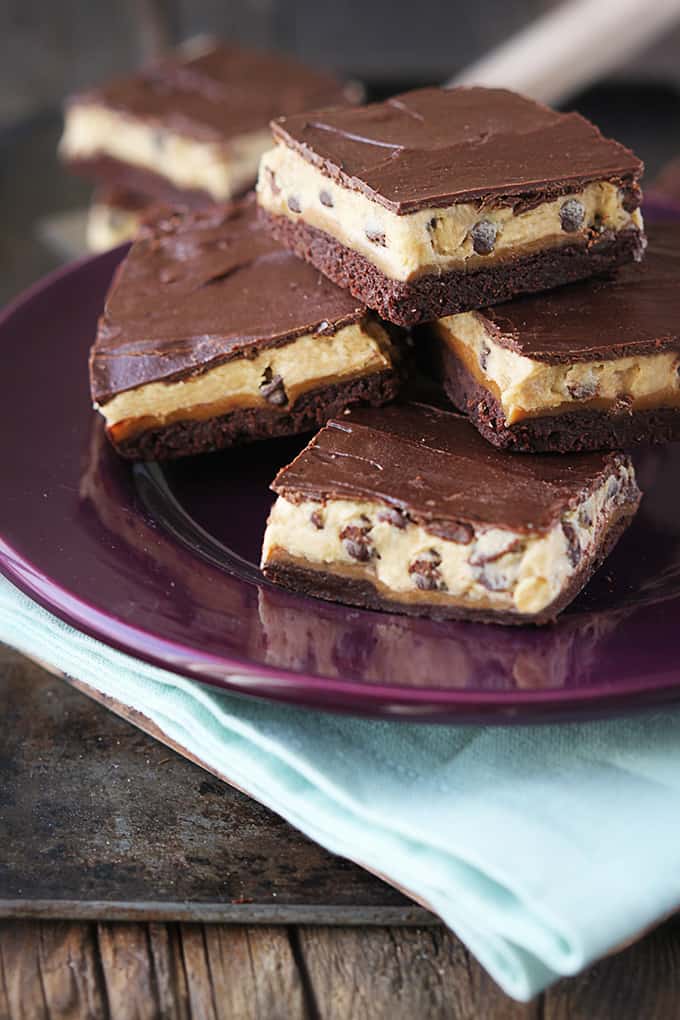 trillionaire bars on a plate on a blue cloth napkin.