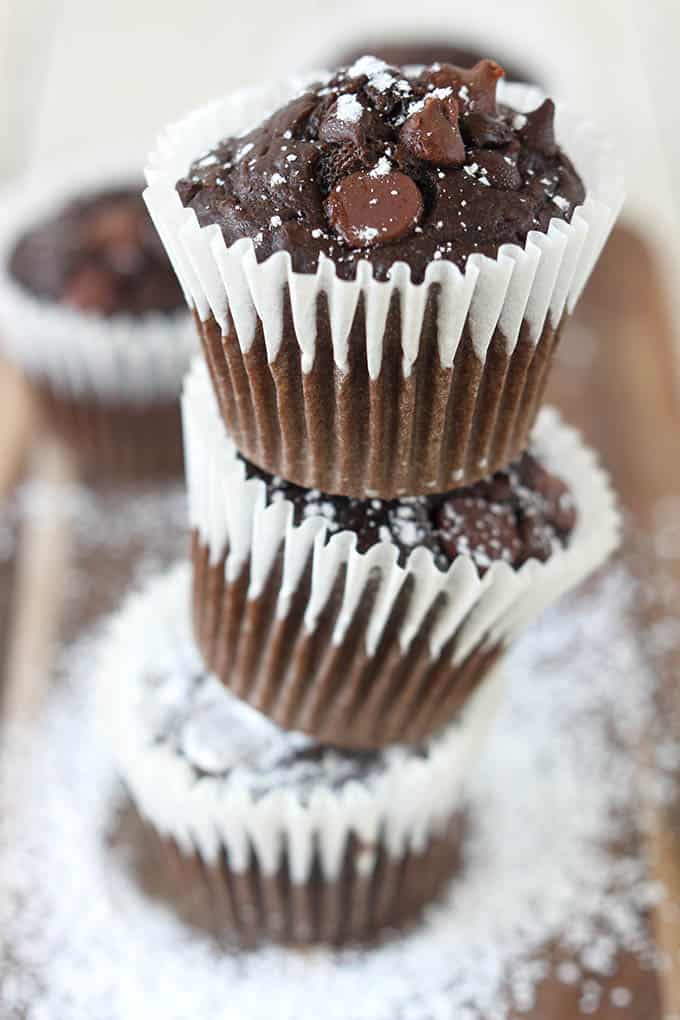 stacked triple chocolate chip muffins.