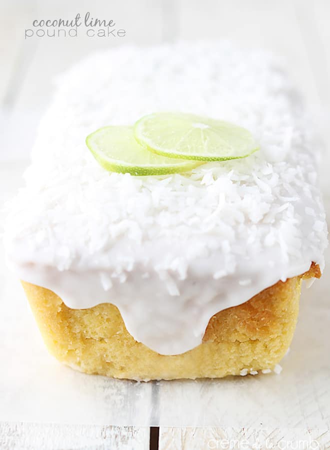 coconut lime pound cake topped with coconut lime glaze and slices of lime with the title of the recipe written on the top left corner of the image.