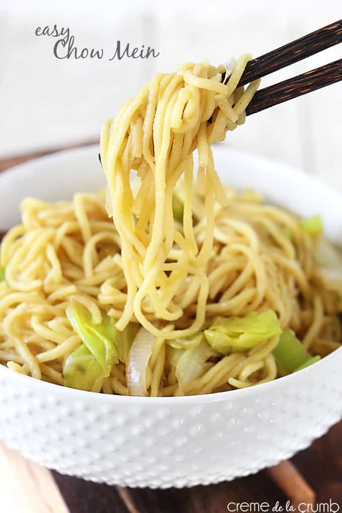 chow mein in a bowl with chopsticks picking up a bite with the title of the recipe written on the top left corner of the image.