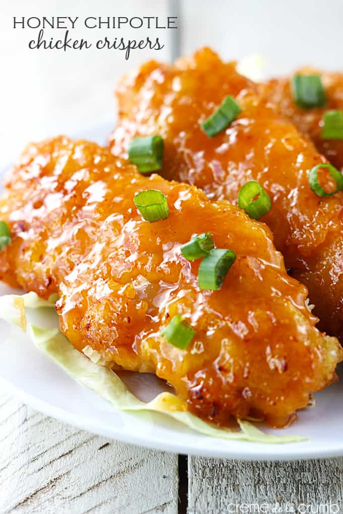 honey chipotle chicken crispers on a plate with the title of the recipe written on the top left corner of the image.