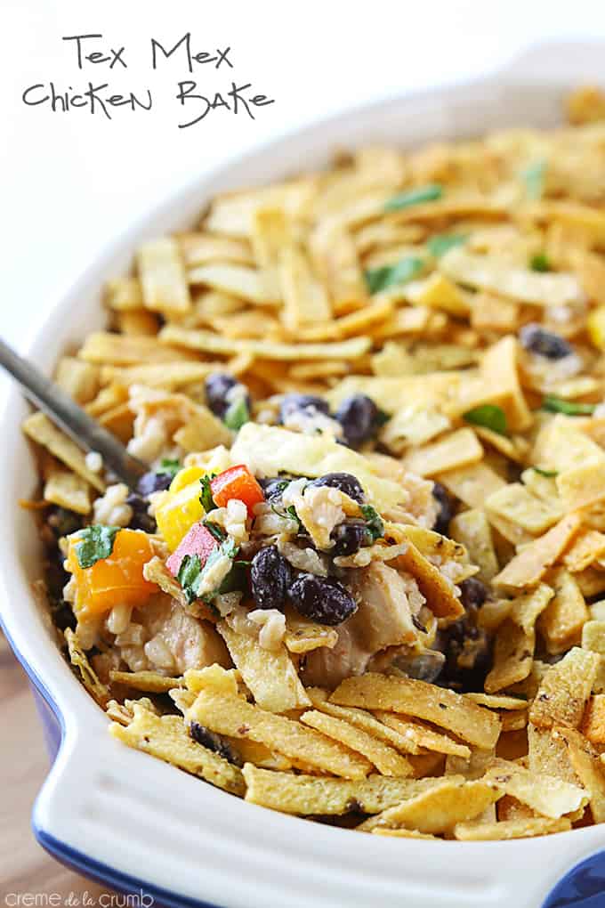 tex mex chicken bake with a spoon in a serving tray with the title of the recipe written on the top left corner of the image.