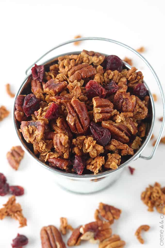 top view of cinnamon pecan granola in a metal bucket.