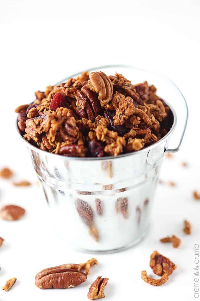 cinnamon pecan granola in a metal bucket.