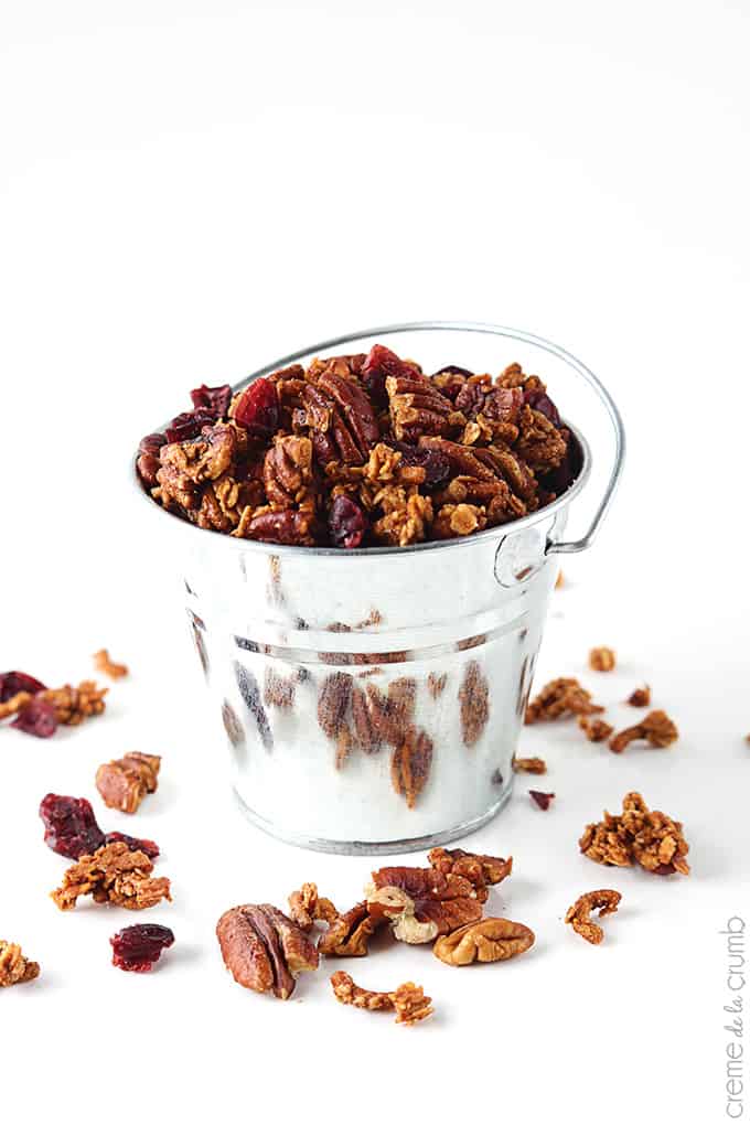 cinnamon pecan granola in a metal bucket.