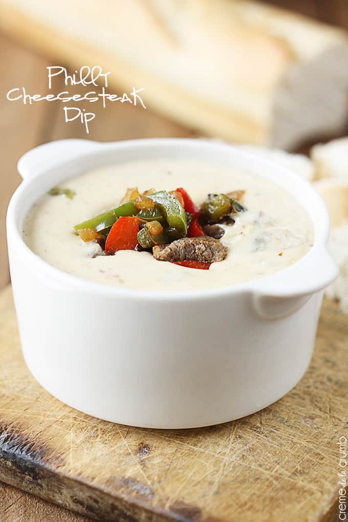 Philly cheesesteak dip in a bowl with the title of the recipe written on the top left corner of the image.