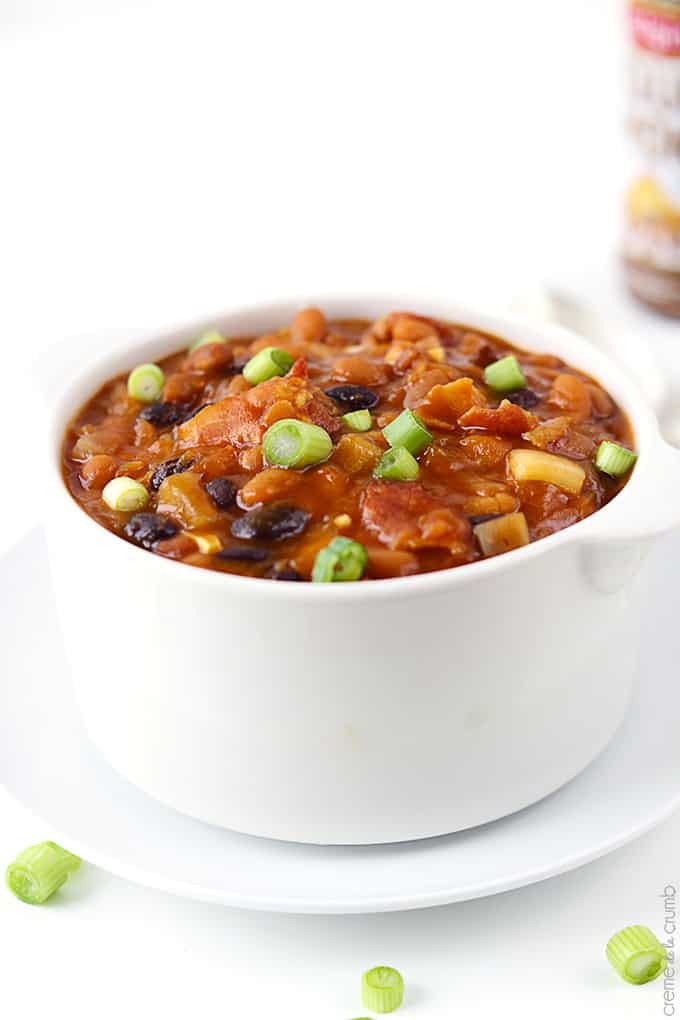 smokey bbq baked beans in bowl on a plate.