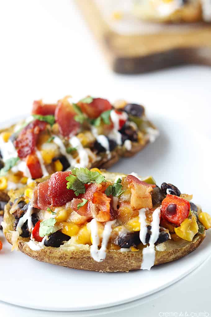 Southwest loaded potato skins on a plate.