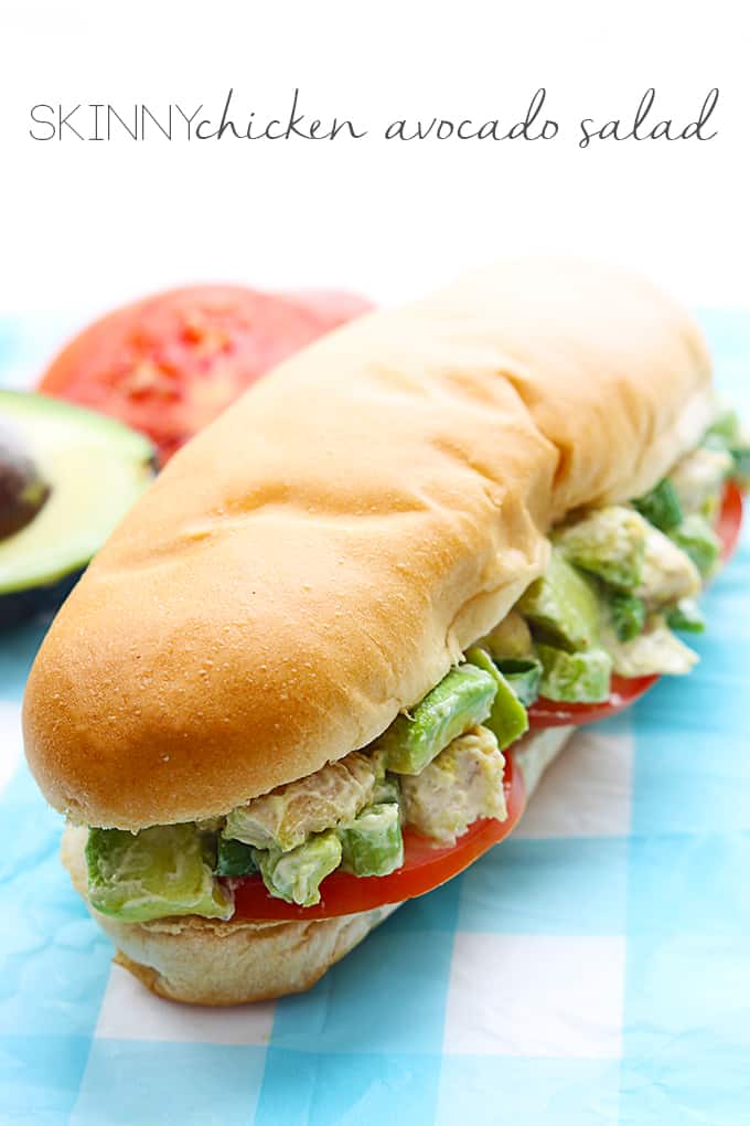 a skinny chicken avocado salad sandwich with the title of the recipe written on the top of the image.