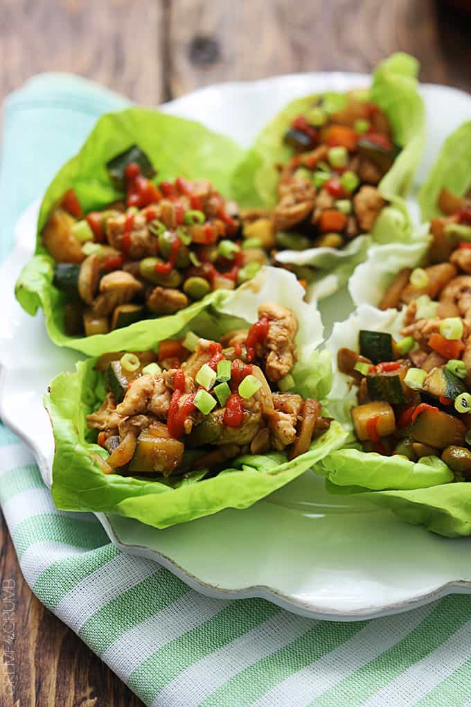 Asian chicken lettuce wraps on a plate.