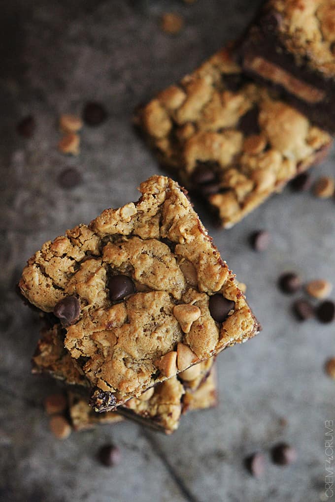 top view of stacked bazooka bars with more bars and chocolate and peanut butter chips on the side.