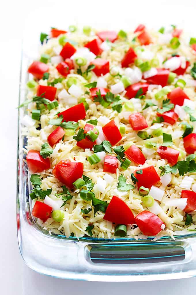 close up top view of 9 layer dip in a tray.