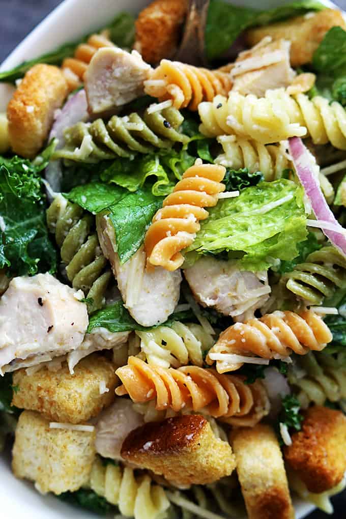 close up top view of chicken caesar pasta salad.