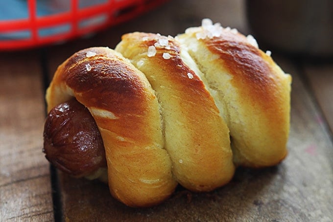 a pretzel dog on a table.