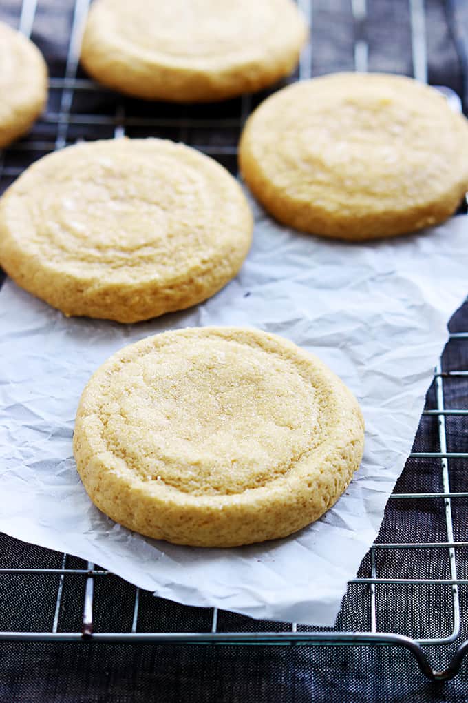 pumpkin sugar cookies on a cooling rack.