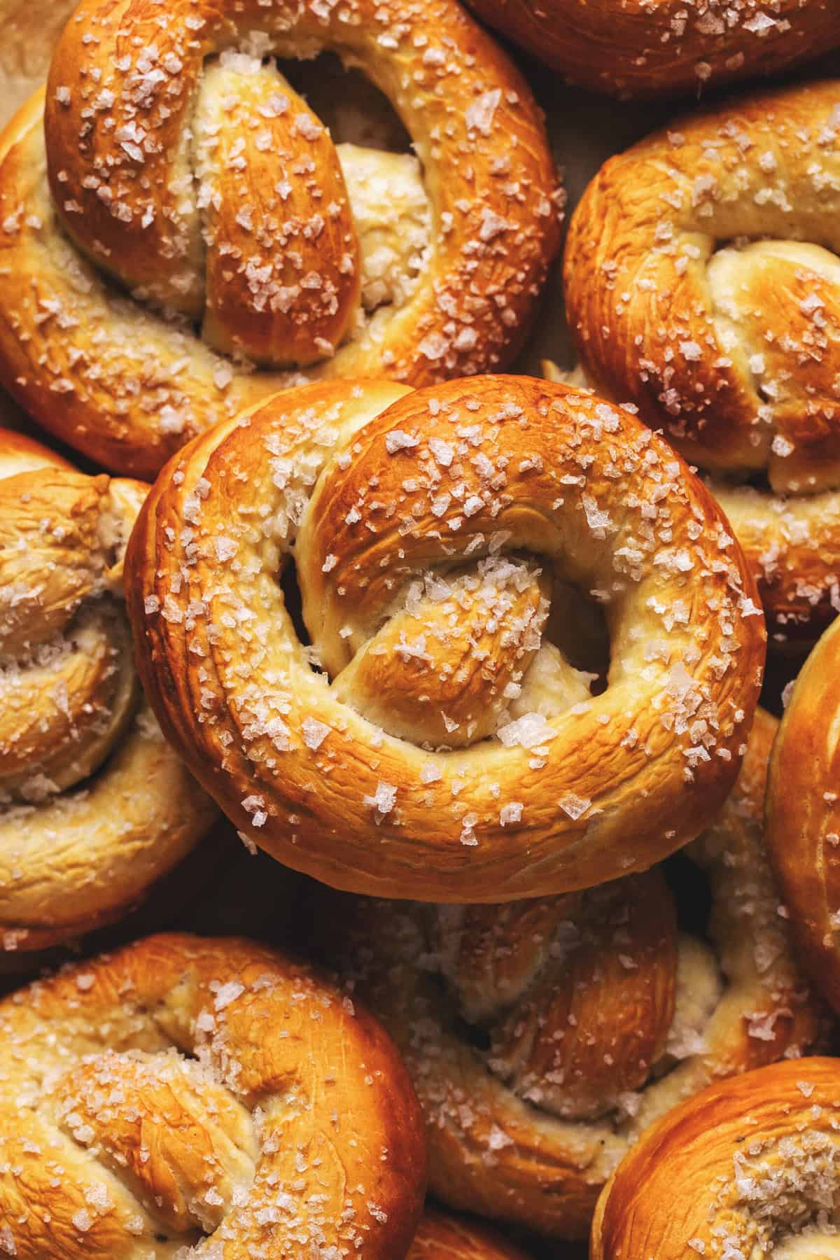 Close up view of German soft pretzels with coarse sea salt. 