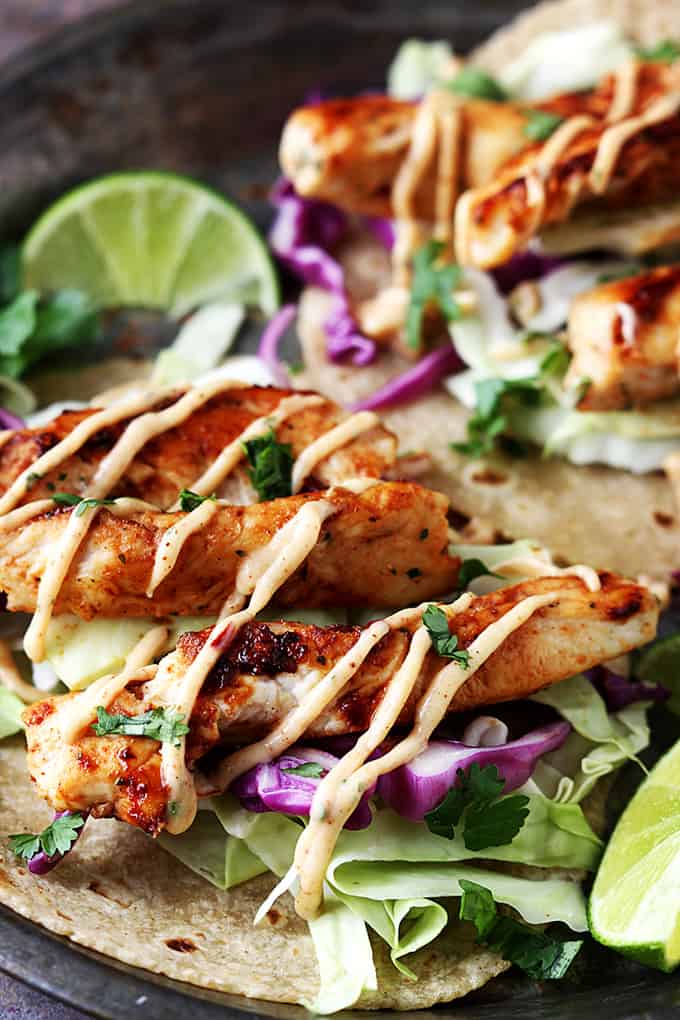 close up of Jamaican jerk chicken tacos on a plate.