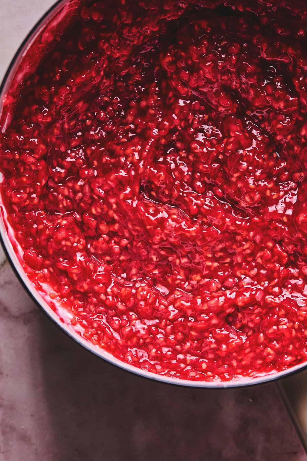 Up close view of raspberry cake filling.