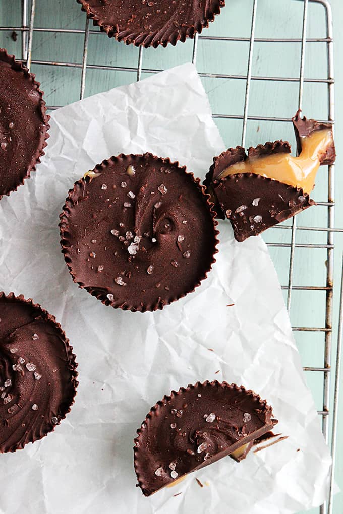 top view of full and pieces of salted caramel cups.