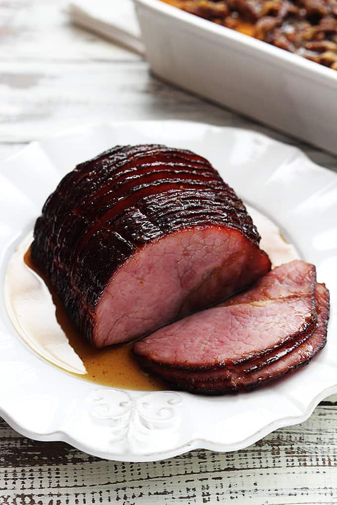 slow cooker glazed ham on a plate.