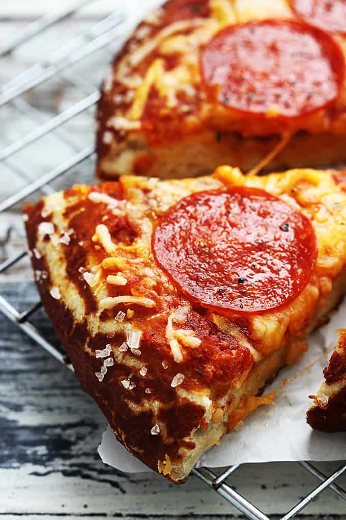 close up of a slice of pretzel crust pizza.