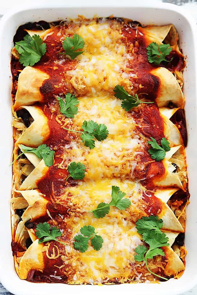 top view of turkey enchiladas in a baking dish.