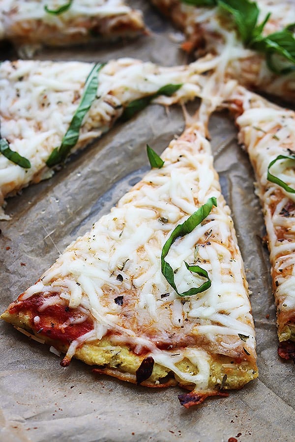 close up of cauliflower crust pizza slices.