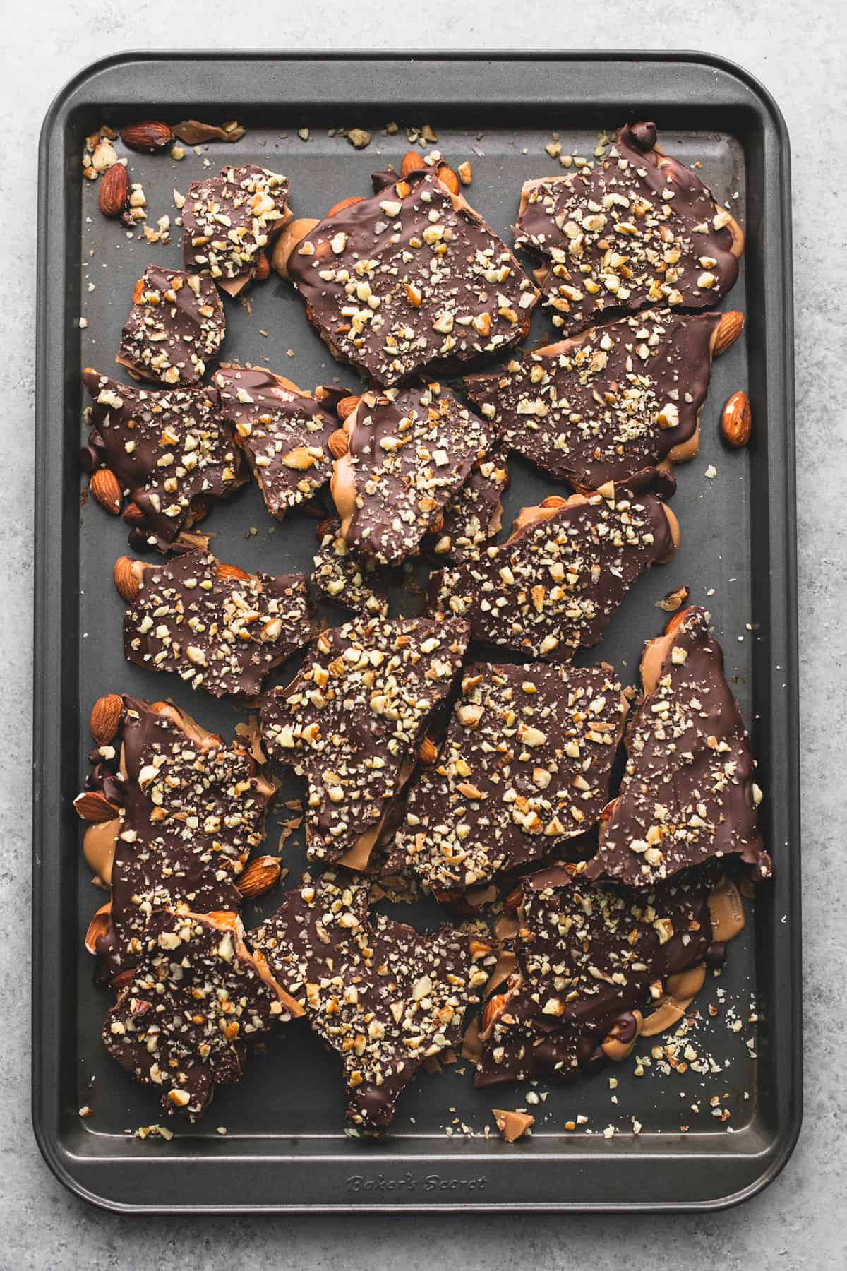 top view of easy homemade English toffee on a baking sheet.