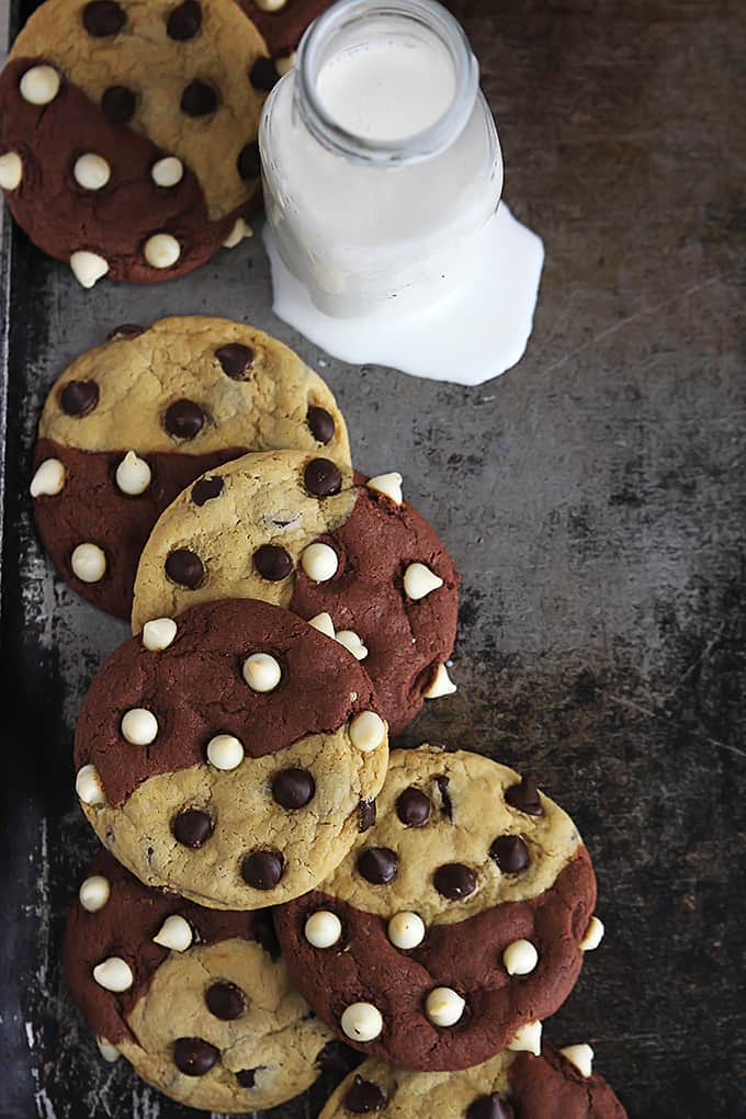 top view of true love cookies (aka: brookies)  with a glass jar of milk.