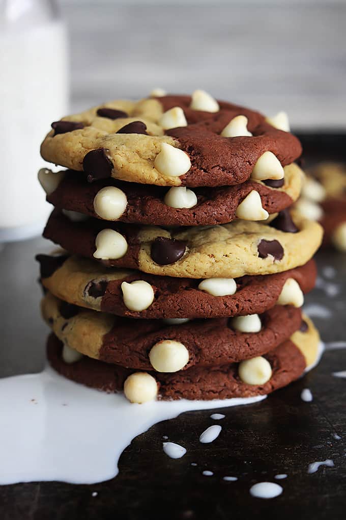 stacked true love cookies (aka: brookies) on top of a puddle of milk.