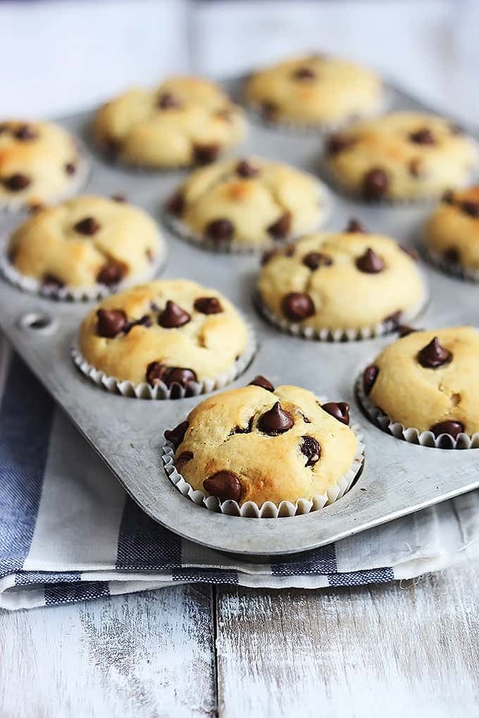 greek yogurt muffins in a muffin tin.