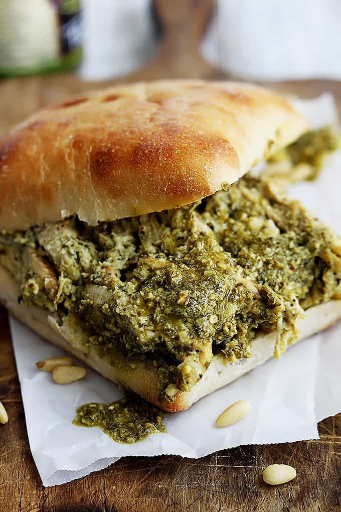 close up of a pesto chicken sandwich.