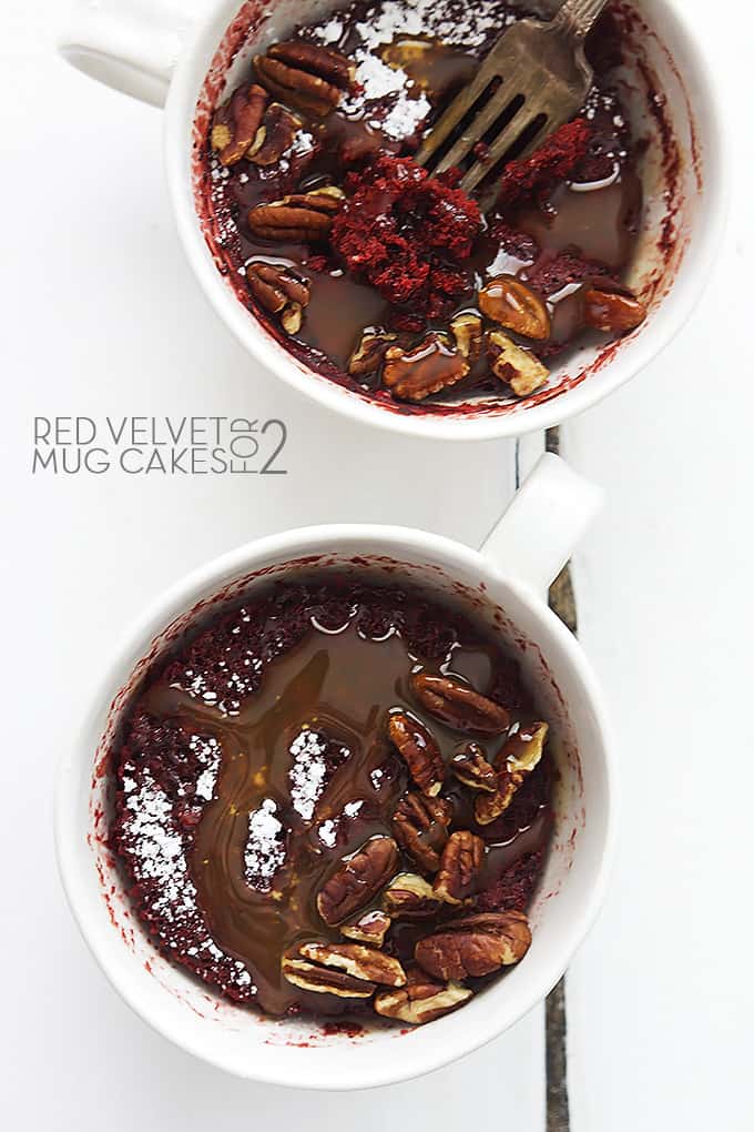 top view of red velvet mug cakes with the title of the recipe written on the left side of the image.