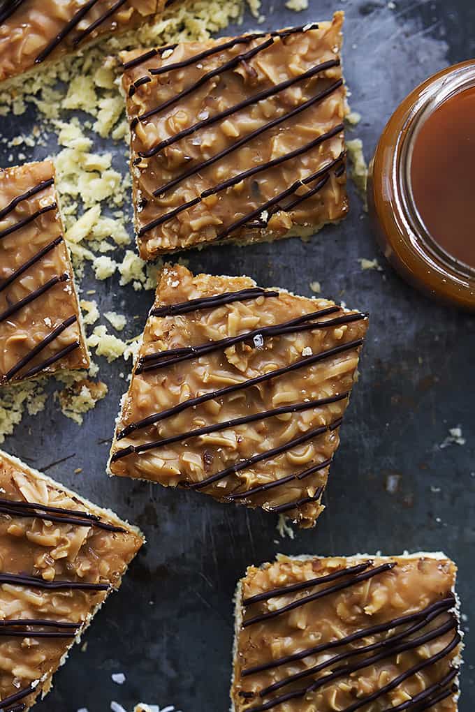 top view of Samoa bars with a jar of caramel on the side.