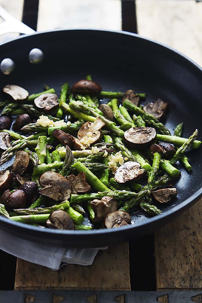 asparagus and mushrooms in a skillet.