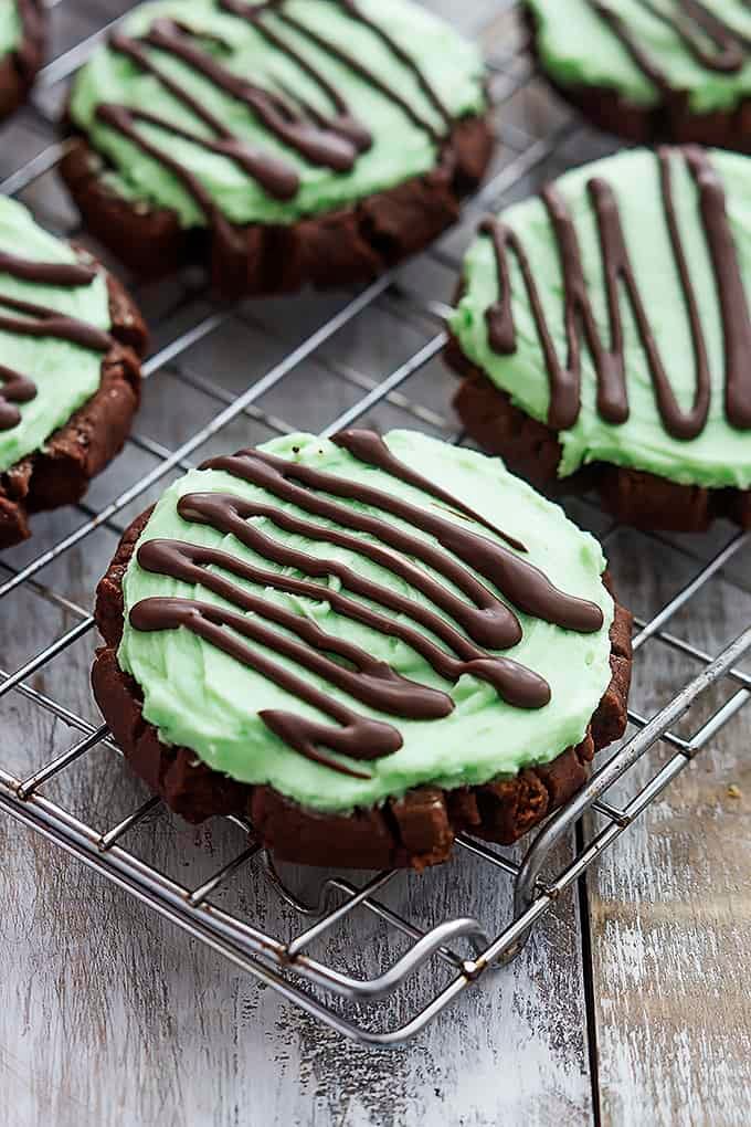 grasshopper sugar cookies on a cooling rack.