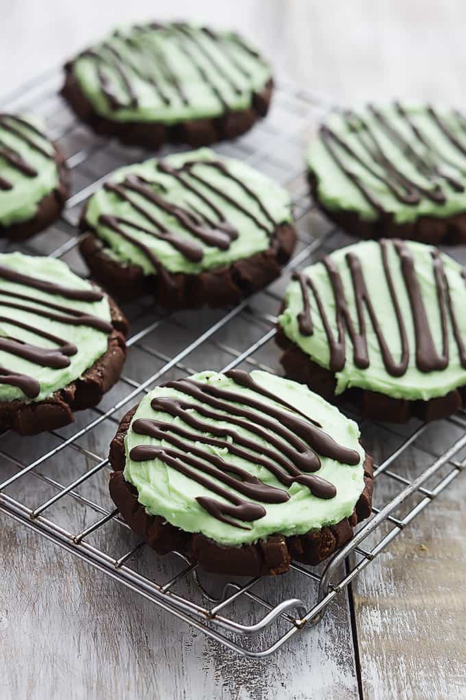grasshopper sugar cookies on a cooling rack.